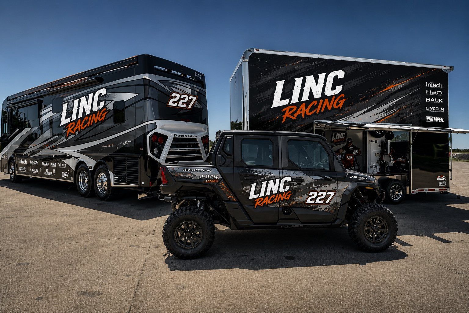 The full LINC Racing rig: the wrapped Newmar Dutch Star coach, Polaris Xpedition XP 1000, and inTech race trailer.
