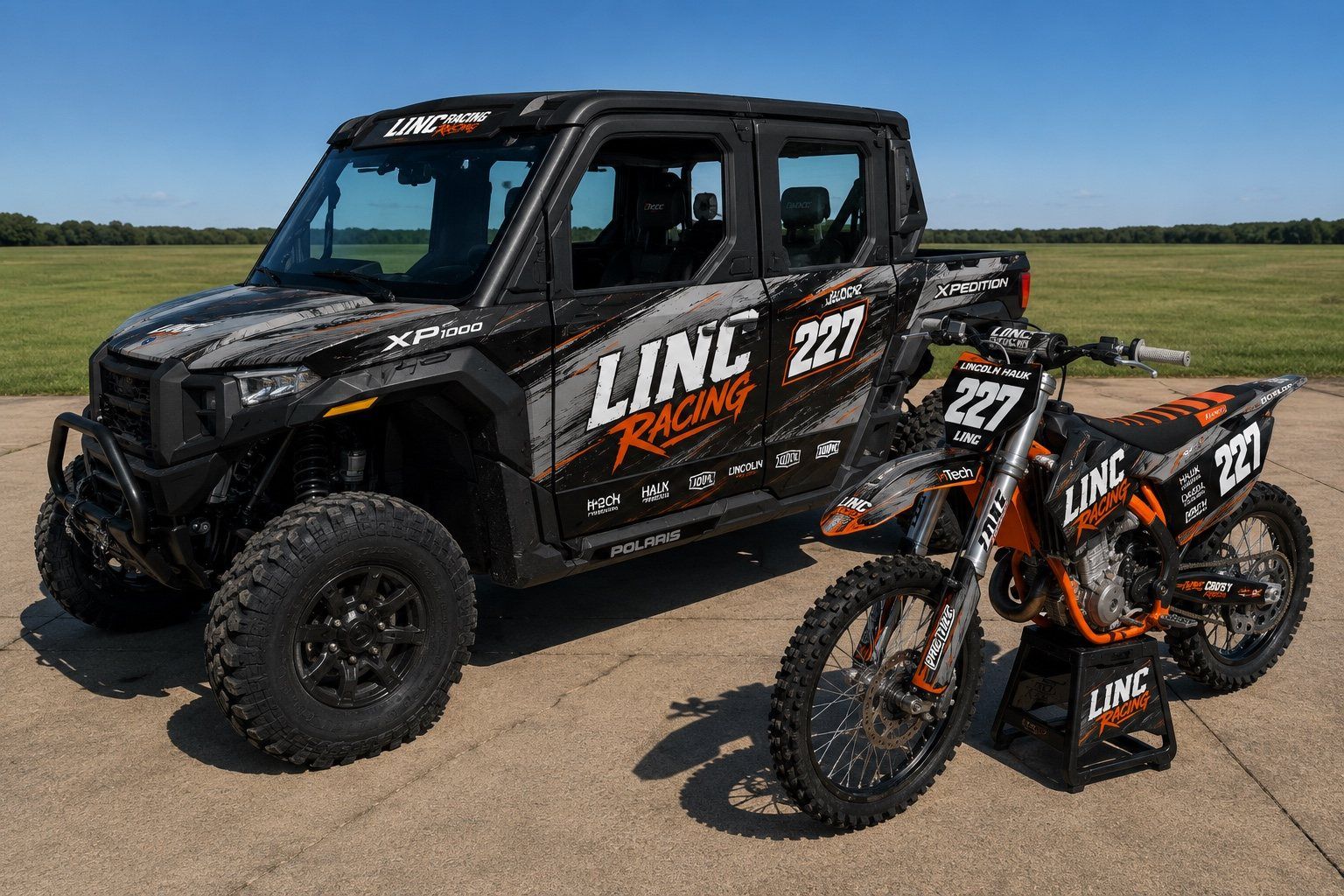 LINC Racing Polaris Xpedition XP1000 parked beside the number 227 race bike.